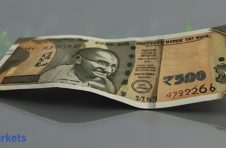 Rupee ends a tad lower, hurt by corporate dollar bids, outflows