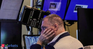 S&P 500 ends nearly flat, gives back gains;…