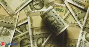 Rupee falls 14 paise to 86.57 against US…